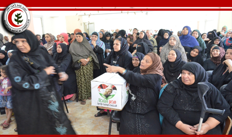 بالصور: مصر العطاء توزع 400 كرتونة رمضانية على فقراء منطقة أولاد علام